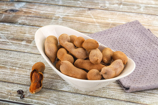 Tropical exotic Tamarind fruit heap