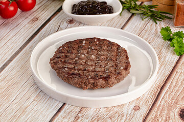 Grilled juicy beef cutlet for burger