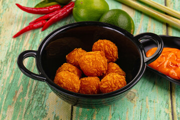 Fried crispy yellow cheese balls