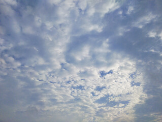 Scattered Clouds in a Blue Sky
