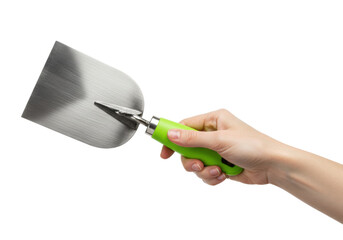 Isolated hand holding a metal pointing trowel with green handle, home repair and construction
