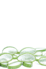 Close-up of Sliced Aloe Vera Pieces on a White Background