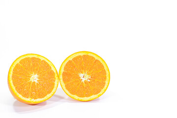 Halved Valencia Oranges on a White Background