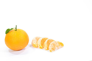 Whole Valencia Orange and Orange Segments on a White Background