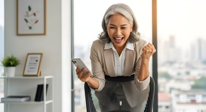 Dynamic Medium Shot of a Person Working on a Laptop in a Modern Office