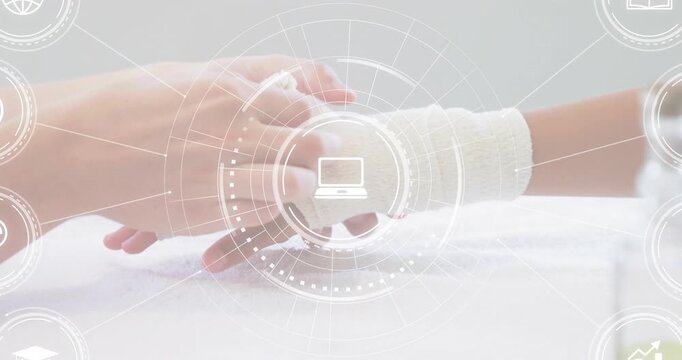Medical nurse's hands inspecting wrap on child's ankle, smoothing bandage and securing support - Powered by Adobe