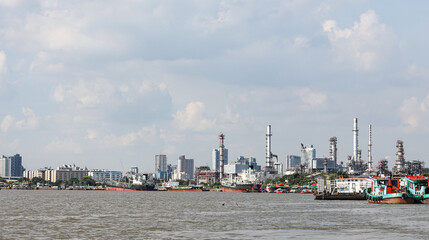 panorama view of Oil and gas industry, factory - petrochemical plant, refinery and transportation under sun light whit beautiful blue sky, Bang jak, Bangkok, Thailand © MMxeon