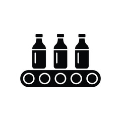 Industrial production line with three bottles on a conveyor belt