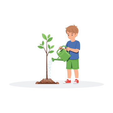 Young boy watering a newly planted tree with a green watering can, symbolizing growth and care.