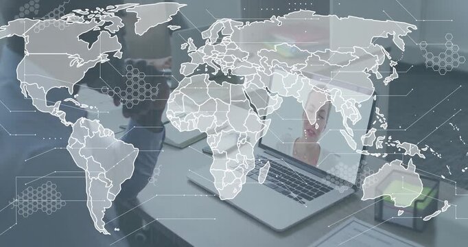 Receiving remote business meeting call, meeting host noting action items while world map growing in