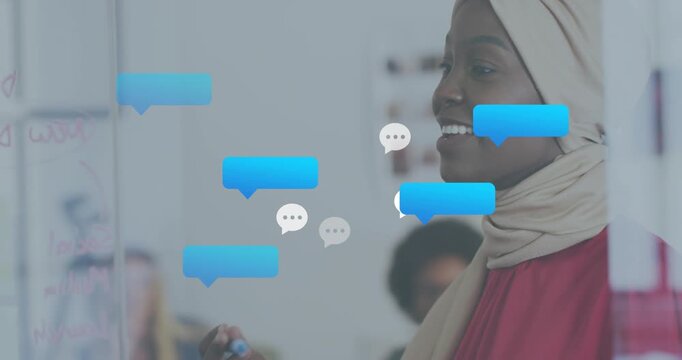 Speaker writing glass board drifting chat bubbles initiating feedback cluster in business meeting