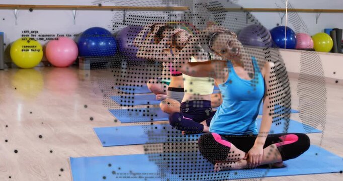 Instructor tilting head stretching neck in yoga studio showing transparent world map, code overlay