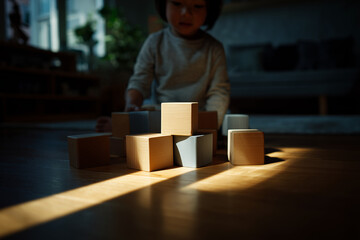 Child Playing with Wooden Building Blocks