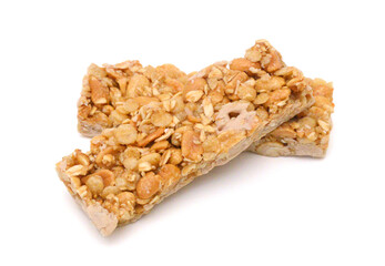 Honey bars with peanuts, sesame and sunflower seeds isolated