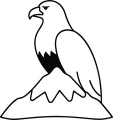 Majestic bald eagle perched on a rugged mountain peak