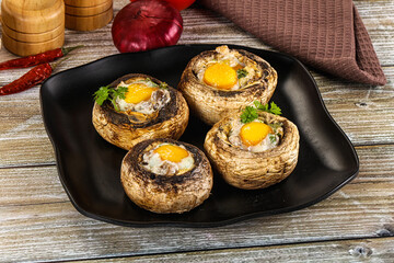 Baked champignon with quail egg