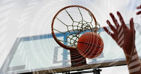 Hands entering frame contesting shot, basketball hovering before swishing through net for scoring - Powered by Adobe