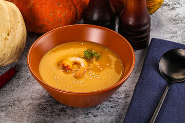 Pumpkin cream soup with prawns