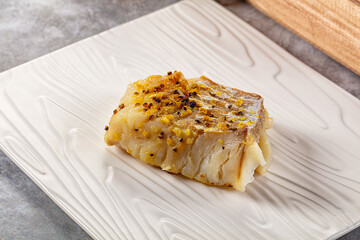 Steamed cod fish fillet with spices