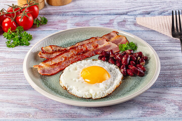 English breakfast with egg, bean and bacon
