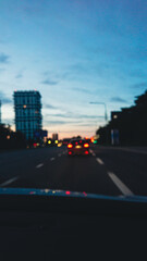 Bokeh roadway lights streak across frame, bokeh texture adds cinematic feel, bokeh pattern pairs with minimal copy space