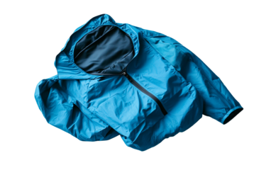 Portable waterproof jacket displayed with storage bag ideal for outdoor adventure and travel gear themes isolated on transparent background PNG