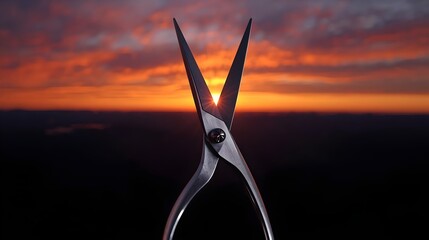 A sharp, metallic pair of scissors, rendered in a photorealistic style, are mid-action, their blades slicing cleanly through the distant horizon. The sky above is a vibrant gradient of sunset oranges 