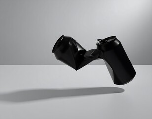 Black can in mid-air, cracked open
