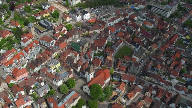 Aerial around the city bretten in Germany on a cloudy spring day.
