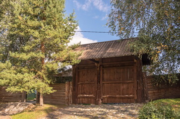 Antique wooden gate in a rural courtyard