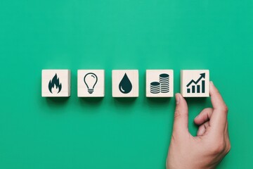 Concept of an energy crisis and inflation with rising prices for essential utilities like gas, water, and electricity shown with icons on blocks