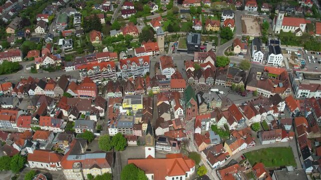 Aerial around the city bretten in Germany on a cloudy spring day.