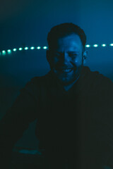 man portrait in moody cinematic rgb background 