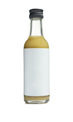 Small glass bottle full of juice with blank mockup label template isolated on white background
