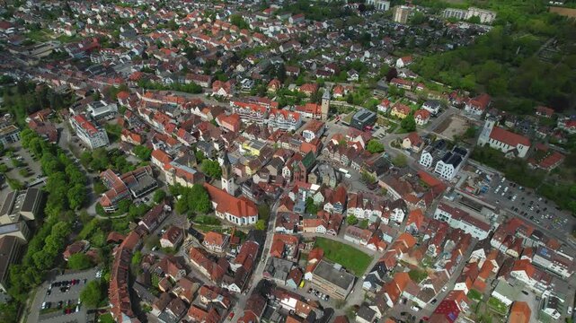 Aerial around the city bretten in Germany on a cloudy spring day.
