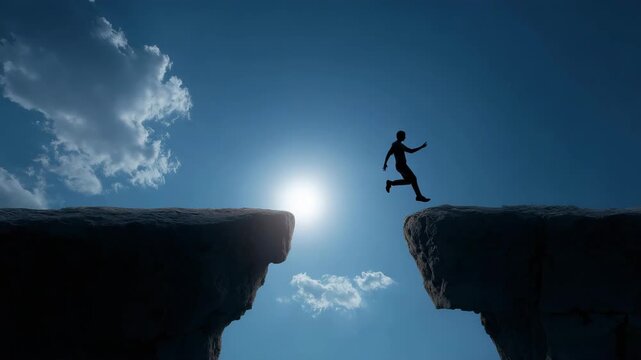silhouette man jumping across gap between two cliffs symbol of courage overcoming fear risk taking personal growth