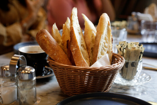 Paris, France, Europe.  Local bistro - basket of bread.