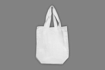 Reusable White Cotton Shopping Bag Mockup isolated on a grey background. Zero waste and eco friendly. 3d rendering.