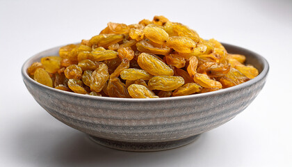 Fototapeta premium Yellow Color Golden Raisins In Ceramic Bowl Dried Raisins Natal In Gray Bowl Yellow Raisins On White Background Kismis In Ceramic Bowl