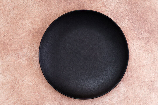 Black plate above mockup in this minimalist setting