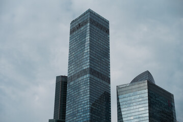 mirrored windows of the facade of an office building