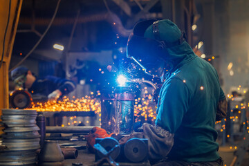 Welding Sparks in an Industrial Workshop Environment, Showcasing Craftsmanship and Skills