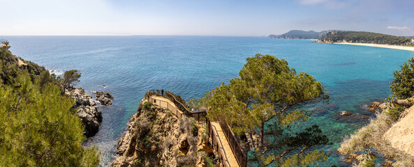 One of Lloret de Mar's coastal paths offers magnificent views of the Costa Brava and the climb to Sant Joan Castle. Lloret de Mar, Spain