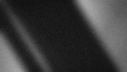 Abstract blurry gradient with soft transitions of black and white, featuring a grainy texture for modern monochromatic backdrops and banners