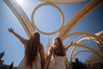 Girls Golden Arches Disneyland Celebration