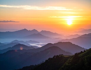 Obraz premium A breathtaking sunrise paints the mountain ranges in hues of orange, purple, and blue, creating a serene and majestic vista.