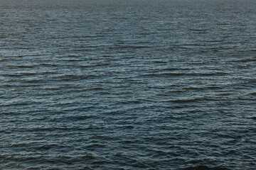 waves on the river filmed on an autumn evening