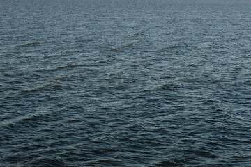 waves on the river filmed on an autumn evening