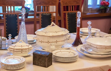 A table set with vintage china dishes for lunch