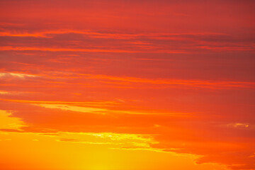A Vibrant Sunset That Spreads Over a Serene and Calm Horizon, Creating a Picturesque Scene